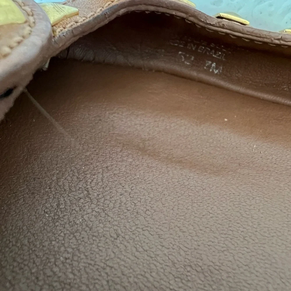 Tory Burch Camel Brown Leather Flats with gold grommet accents